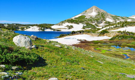 Snowy Range Mountains and lake in Medicine Bow, Wyoming in summerの写真素材