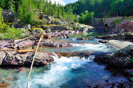 white water rapids in Glacier National Park, Montana in summerの写真素材