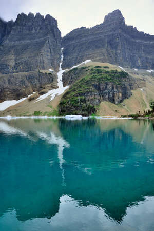 Iceberg Lake glacier in Glacier National Park in summerの写真素材