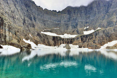 Iceberg Lake glacier in Glacier National Park in summerの写真素材