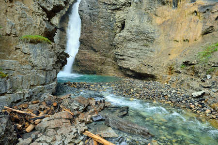 Waterfall along the Icefields Parkway in the Canadian Rockies between Banff and Jasperの写真素材