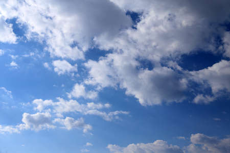 Blue sky with cloudsの写真素材