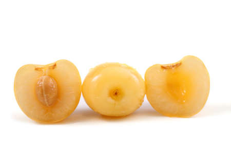 Yellow cherries with a halfの写真素材