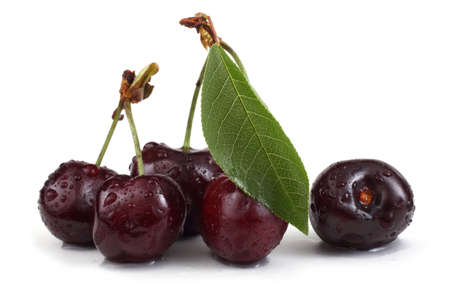 Red cherries isolated on whiteの写真素材