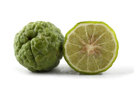 Kaffir lime isolated on whiteの写真素材