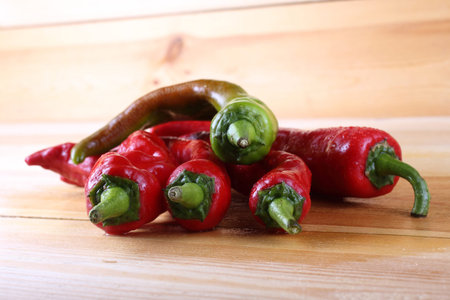 Red hot peppers on table