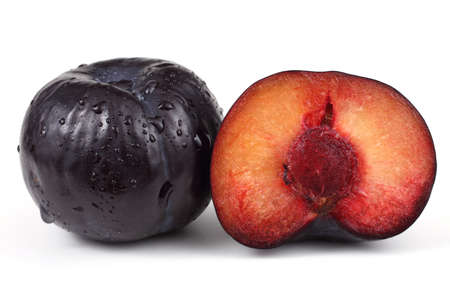 Black plum with a halfの写真素材