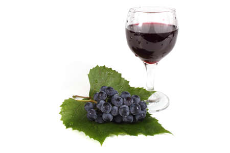 Black grape and wine isolated on whiteの写真素材