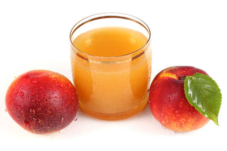 Nectarines and juice isolated on whiteの写真素材