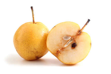 Pear with a half isolated on whiteの写真素材