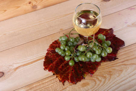 Grape and wine on tableの写真素材