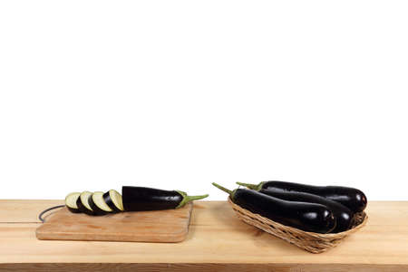 Eggplants on table isolated on whiteの写真素材
