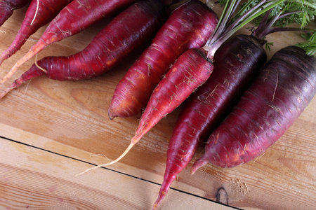 Red carrots on tableの写真素材
