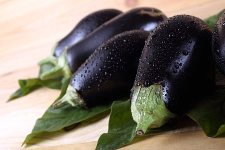 Aubergines on table
