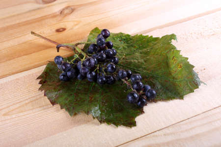 Black wine grape on tableの写真素材