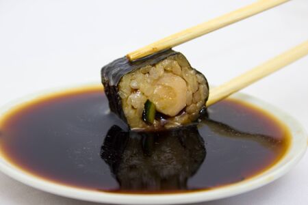 Japanese cuisine, rice sushi and fish - closeup, vegetarian dishの写真素材