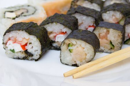 Japanese cuisine, rice sushi and fish - closeup, vegetarian dishの写真素材