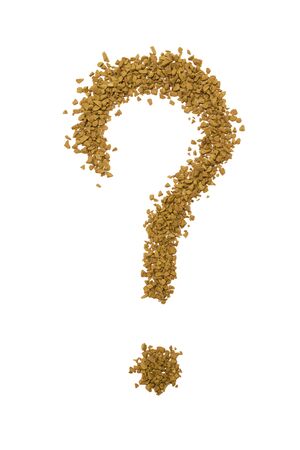 Dry instant coffee granules in the shape of a question mark - brown texture, on a white backgroundの写真素材