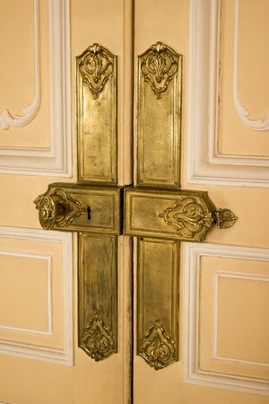 Vintage door lock with handle - in gilding, museumの写真素材