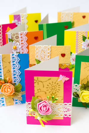 Beautiful varied handmade greeting cards - on a white backgroundの写真素材