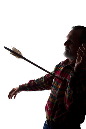 Portrait of a old man, unshaven, with beard, side view - dark isolated silhouetteの写真素材
