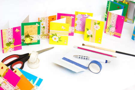 Beautiful varied handmade greeting cards - on a white backgroundの写真素材
