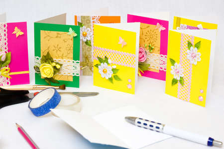Beautiful varied handmade greeting cards - on a white backgroundの写真素材