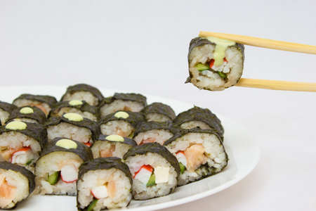 Japanese cuisine, rice sushi and fish - closeup, vegetarian dishの写真素材