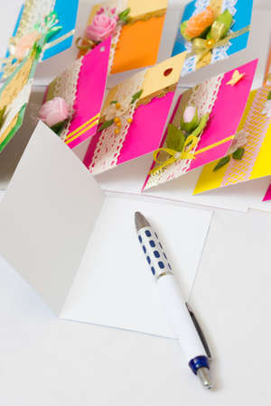Beautiful varied handmade greeting cards - on a white backgroundの写真素材