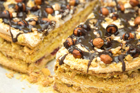 Cake with hazelnuts and chocolate in the form of heart - texture, backgroundの写真素材
