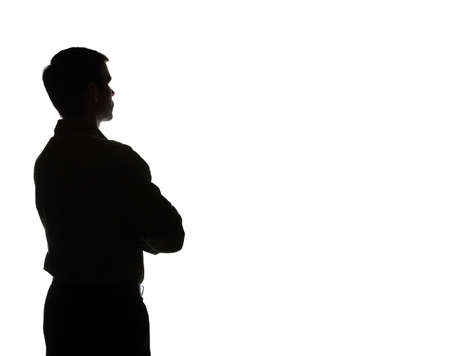 Portrait of a young man, view from the back - silhouetteの写真素材