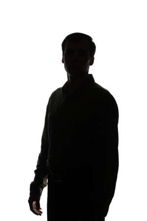 Portrait of a young man, front view - silhouetteの写真素材