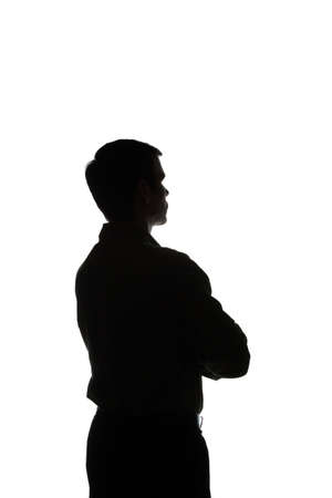 Portrait of a young man, view from the back - silhouetteの写真素材