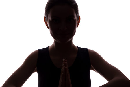 Young woman looking with hope and request - horizontal silhouette of a front view