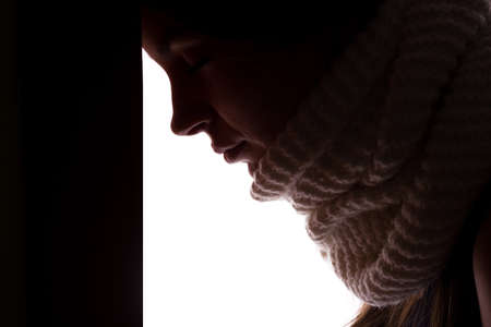 Silhouette of a young woman with problems - horizontal, isolatedの写真素材