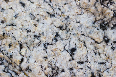 The texture of the granite surface of the stones - marble stone backgroundの写真素材