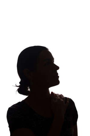 Silhouette of a young girl side view with hairstyle - isolated, nonameの写真素材