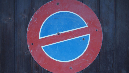 Old road sign No parking, Swiss Alps, Switzerland