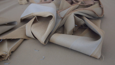 Removing the old cloth from the bed table of American billiards (American pool)