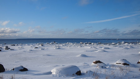 Stunning sea view on a crisp and snowy winter day, Baltic Sea Ñoast, Gulf of Finland, Estoniaの写真素材