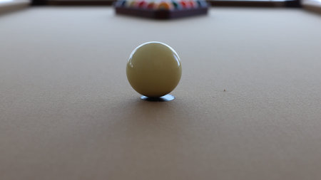 Billiard ball (pool ball) on American billiards (American pool) while checking the playing surface...
