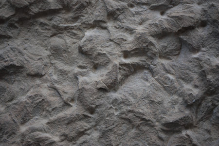 Fragment of the old facade of a house made of natural stone, Italy, Florence