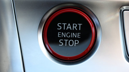 Extreme close-up of a sport car engine start and stop button.の写真素材