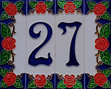 House number twenty seven on decorative tiles on the house wall, Germanyの写真素材