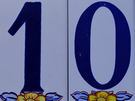 House number ten on decorative tiles on the house wall, Germanyの写真素材