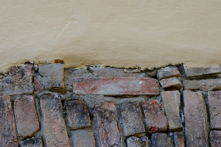 Fragment of the old facade of a house close-up, Italy