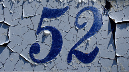House number plate 52 close-up, Italyの写真素材