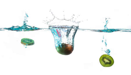 kiwi splashes on white backgroundの写真素材