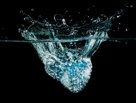 Christmas bell splash in water