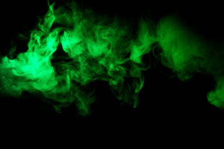 green smoke at black backgroundの写真素材